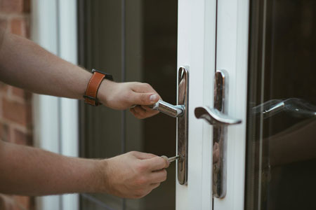 man gaining access to his property with key